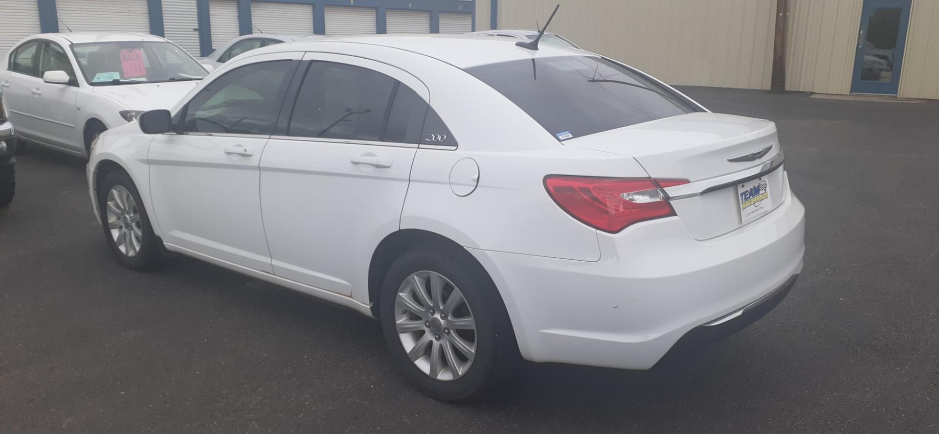 2012 Chrysler 200 Touring (1C3CCBBB9CN) with an 2.4L L4 DOHC 16V engine, 6-Speed Automatic transmission, located at 2015 Cambell Street, Rapid City, SD, 57701, (605) 342-8326, 44.066433, -103.191772 - CARFAX AVAILABLE - Photo#2